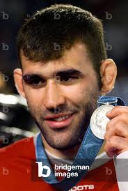 Image of NICOLAS GILL, DU CANADA, DÉTIENT SA MÉDAILLE D'ARGENT SUR LE