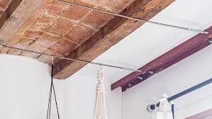 Hang grow lights from your ceiling studs. How To Hang Plants From Your Ceiling In Less Than 20 Minutes Apartment Therapy