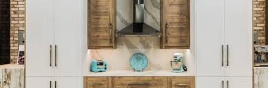 Crown molding or crown molding with decorative accents such as rope or a basket weave pattern can complete the look of your kitchen or below wall cabinet treatments sometimes called light rail can be installed at the base of the top cabinet for a more finished look or to hide under. Floor To Ceiling Cabinets Monterey Ca Cypress Design Build