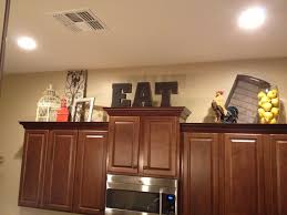 decorating above kitchen cabinets