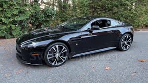 Image result for Carbon Black 2011 Aston Martin