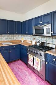 Here are 10 looks we're absolutely loving right now. Navy Blue Kitchen Trend Ideas Domino Blue Kitchen Designs Blue Kitchen Decor Kitchen Design