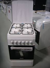 Cocina de 5 fuegos blanca con gas butano, compartimento para botella de butano (portabombona) y sistema de seguridad ffd. Cocina Con Horno Gas Butano O Natural Baratos