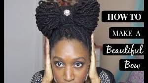 How To Make A Beautiful Bow Dreadlocks Tutorial Youtube Bun Bow Cornrows With Box Braids Kids Braided Hairstyles