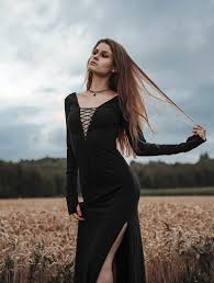 I do not own the rights to this video.anyway. Valkyrie Black Long Sleeved Long Split Dress With A Lacing At The Back