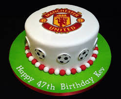 Bottom tier was caramel with vanilla swirls and top tier was chocolate mud cake. Football Manchester United Cake Football Cake Decorations Football Cake Cake