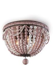 They'll provide a nice bright light to open up your room without taking up any space and thanks to ambitious designs they add lovely visual appeal. Whitewash Natural Wood Bead Flush Mount