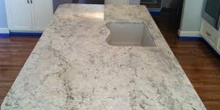 Off white cabinets, stainless steel. White Moon Granite Countertop White Granite Archives Granite By Steve Moon Granite Counte White Ice Granite Granite Countertops White Granite Countertops