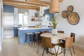 Browse 60,606 beige and black kitchen on houzz you have searched for beige and black kitchen ideas and this page displays the best picture matches we have for beige and black kitchen ideas in august 2021. Blue Kitchen Peninsula Lined With Backless Black And Tan Stools Transitional Kitchen