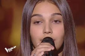Dans cette émission, de jeunes enfants talentueux s'affrontent pour tenter de remporter le titre et pouvoir enregistrer leur album. Replay The Voice Kids Manon Chante Writing S On The Wall De Sam Smith Video