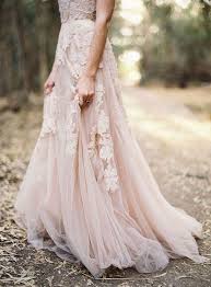 The wedding details take form in outdoor venues, candles, fairy lights, flower crowns, and unique gown elements. Bohemian Wedding Dresses For Stylish Brides Modwedding