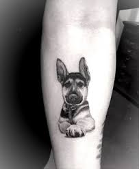 50 Special Dog Tattoos Derelictattoo A Site That Will Rule All Tattoos In 2020 Dog Tattoos Small Dog Tattoos Dog Memorial Tattoos