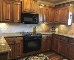 Should I Paint My Oak Cabinets Or Keep Them Stained A Questionnaire Staining Oak Cabinets Oak Cabinets Wood Kitchen Cabinets
