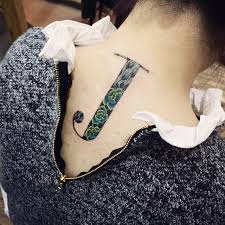 Graffiti, hand signs, colors, and tattoos are indicators of gang affiliation. Letter J Tattoo With Floral Background Tattoogrid Net