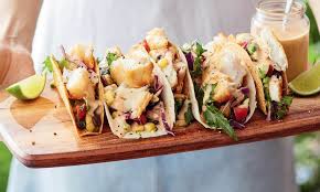 In a food processor, combine diced tomatoes, jalapeño, remaining salt and pepper, cumin, chili powder and all but 1 tablespoon of chopped cilantro. The Ultimate Good Friday Meal How To Make Crispy Fish Tacos With Budget Buys From Aldi Daily Mail Online