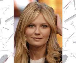 Kirsten Dunst S Curtain Bangs Short Hair Styles For Round Faces Long Hair With Bangs Medium Hair Round Face