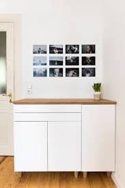 Picture Of An Ikea Metod Cabinet Spruced Up With Wooden Legs And A Wooden Tabletop To Turn It Into A Chic Buffet Ikea Sideboard Ikea Buffet Credenza Ikea