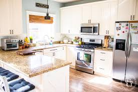 Its reflective qualities bring more light to the space, actually minimizing the need to use artificial light when working in the kitchen during the day. Diy Subway Tile Backsplash Catz In The Kitchen