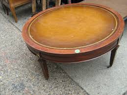Uhuru Furniture Collectibles Leather Top Round Coffee Table 45 Reduced Sold There is a small place where the table is scuffed.