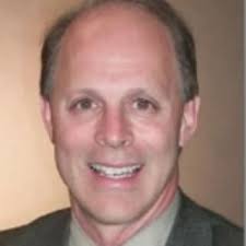 Dr. Ervin Woodle, MD