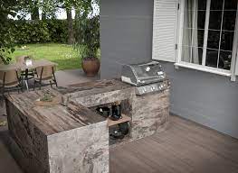 Granite or ceramic tile are very durable and cheaper than a slab, but you have grout that can get dirty and stain or break up, so it's not great from a maintenance. What Is The Best Countertop For An Outdoor Kitchen Academy Marble