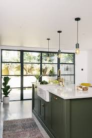 Kitchen diy island project is a beautiful kitchen island idea. A Classic Belfast Sink Was Fitted Into This Chunky Shaker Kitchen Island Painted In Dark Sage Green Green Kitchen Island Shaker Kitchen Island Devol Kitchens