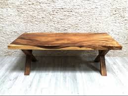 This circle coffee table is crafted from metal and wood, which ensure its sturdiness and durability, and also brings warmth to your living room. Tropical Wooden Table Legs