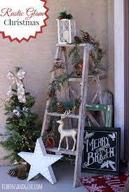 Make a wreath with willow and tighten with ribbons, and then add some wooden stars to twine, bells and tied it all to the wreath form. 40 Stunning Rustic Christmas Decor Ideas Christmas Porch Decor Outdoor Christmas Decorations Christmas Decorations