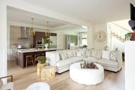 With the crumbling cabinets removed, gorgeous new white cabinets take their place. Pacific National Exhibition By Jillian Harris Transitional Living Room Los Angeles By Maxim Lighting International Houzz