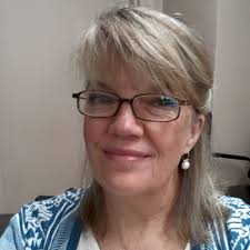 How to decorate a living room with a vintage, gold, and sage green theme?