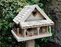 To make a bird table out of pallets. Recycled Pallets Crafted Birdhouse Pallet Ideas