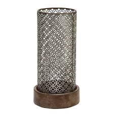 Or choose one of our metal designs for a stunning. Stratton Home Decor Moroccan Hurricane Candle Holder Candleholders Evertribehq Home Kitchen