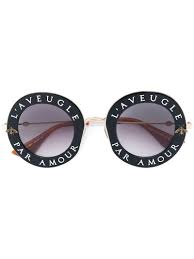 Gucci Black And Gold Laveugle Par Amour Sunglasses Modesens Gucci Eyewear Round Eyewear Metal Sunglasses