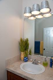 Beach Bathroom Quick Makeover Beach Theme Bathroom Beach Bathrooms Bucket Light