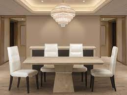 Classy dining room set, featuring a rounded table with a granite tabletop, a beautiful rounded design, and a strong base. The Pros And Cons Of A Stone Top Dining Table Euro Marble
