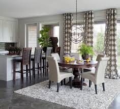 Dining Room Geometric Circle Drapery Panels Beige Leather Dining Chairs Dark Wood Round Pedestal Dining Round Pedestal Dining Table Dining Room Design Home