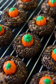 Chocolate Peanut Butter Pumpkin Blossoms Are The Perfect Halloween Cookie Classic Peanut Butter Peanut Butter Pumpkin Peanut Butter Recipes Chocolate Peanuts