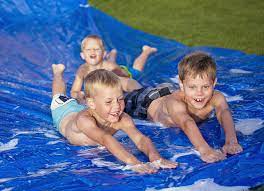 Joyin 20ft x 62in slip and slide water slide with 2 bodyboards, summer toy with build in sprinkler for backyard and outdoor water toys play. How To Make A Homemade Slip And Slide Aussie Edition