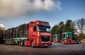 FLAGSHIP ACTROS L MAKES M&M GREENE GO RED - Trucking
