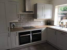 Maybe you would like to learn more about one of these? Light Grey Matt Shaker With Grey Oak Effect Worktop Bluewater Bathrooms Kitchens