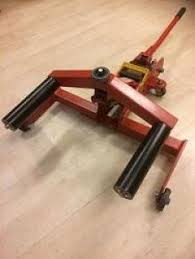 Tire Lift Homemade Tire Lift Constructed From A Surplus Floor Jack Tubing Bar Stock And Bearings Homemade Tools Garage Tools Diy Garage