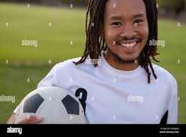 Amateur footballer happy hi-res stock photography and images