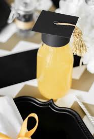 You can also make a simple but adorable design using a wine glass and glow stick or votive. Black And Gold Graduation Party Ideas Celebrations At Home