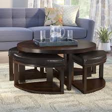 This round coffee table is crafted of solid wood leg and frosted glass top. Coffee Table With Stools You Ll Love In 2021 Visualhunt