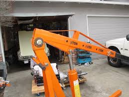 I plan on removing the engine and trany togather and am concerned with the boom length and capacity of the 1 ton, might not be enough. Horrible Freight Harbor Freight Engine Hoist Xweb Forums V3