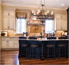 Tie it all together with white cabinets and subway tile for a timeless look. Cream Cabinets With White Trim Painted Kitchen Island Home Antique White Kitchen Cabinets