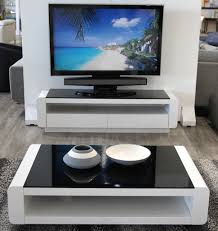 Find coffee tables from a vast selection of tv stands & entertainment units. Mobler Modern Furniture The Bruno Tv Stand And Matching Coffee Table Glossy White Lacquer And Black Tempered Glass The Perfect Black And White Look For Any Modern Space Facebook