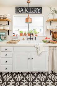 A farmhouse kitchen with an antique enamel topped cabinet also called a vintage baking cabinet. Farmhouse Kitchen The 5 Essentials American Farmhouse Lifestyle