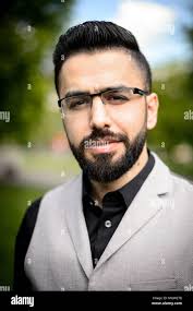 16 April 2018, Stuttgart, Germany: Samer Karam smiling for the camera. The  native Syrian from Aleppo is part of the "Leadership for Syria" program. If  peace happens one day in Syria, Karam