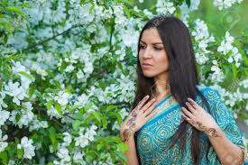 Tall brutal man standing in forest. Asian Woman Near Blooming Apple Tree With Henna Tattoo Stock Photo Picture And Royalty Free Image Image 60513008